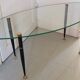 Table basse 1950 ovale en verre acier et laiton