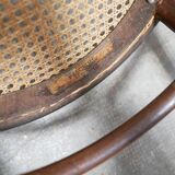 Chaise bistrot cannée ancienne en bois par les éditions Fischel