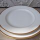 2 plats ronds porcelaine de Limoges bordure dorée