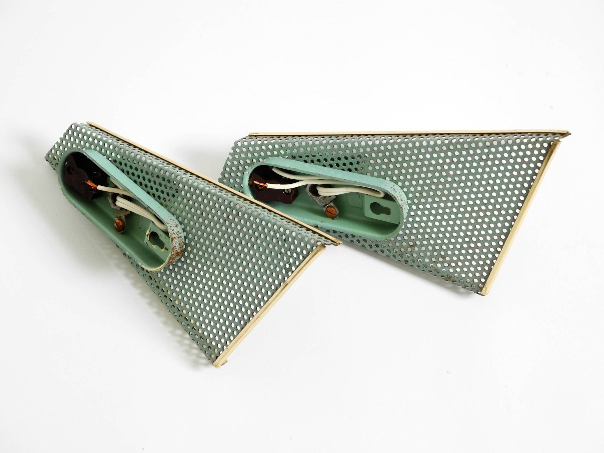 Pair of beautiful mint green Mid Century Modern perforated sheet metal wall