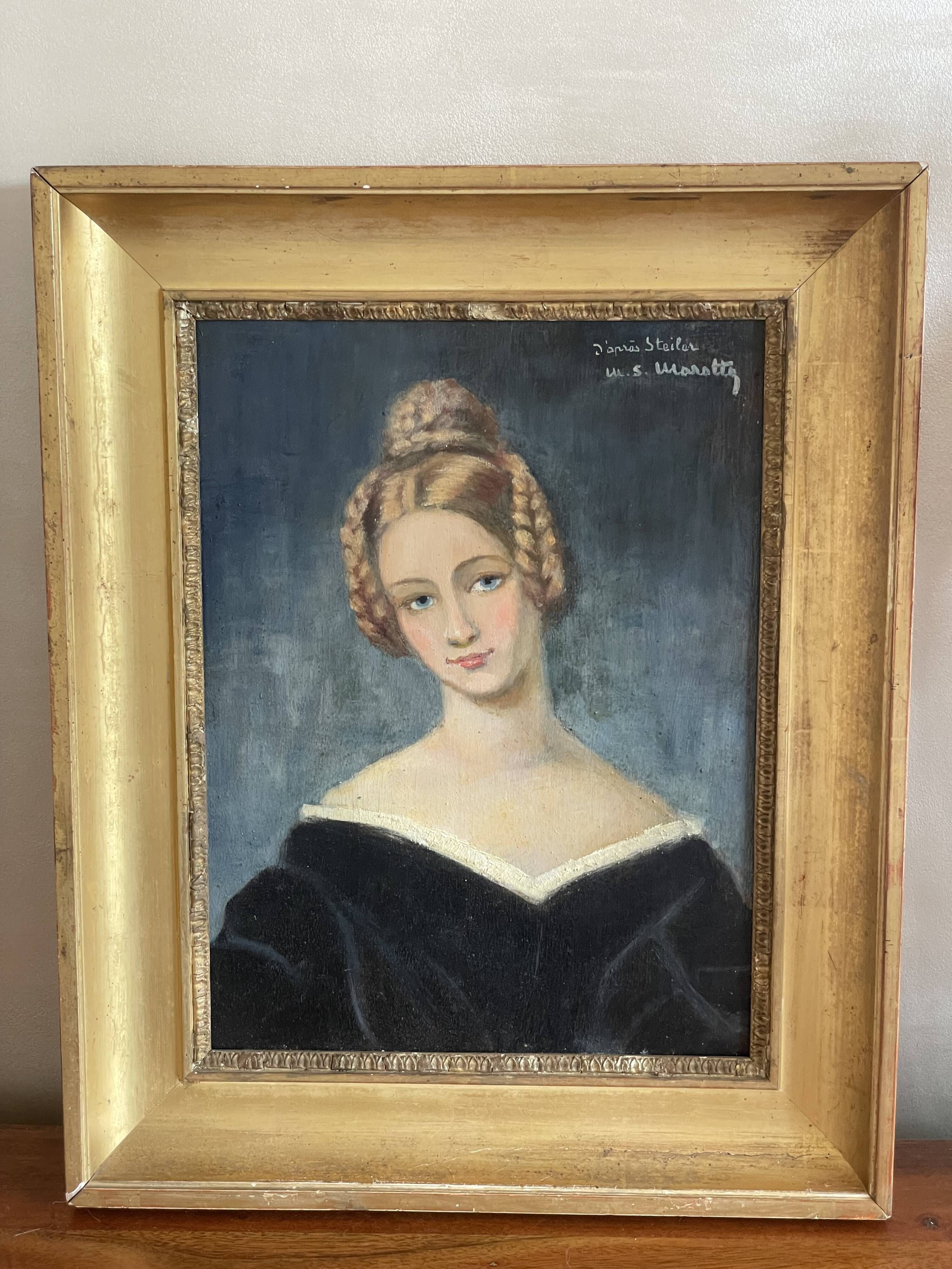 Portrait of young woman painting on wood