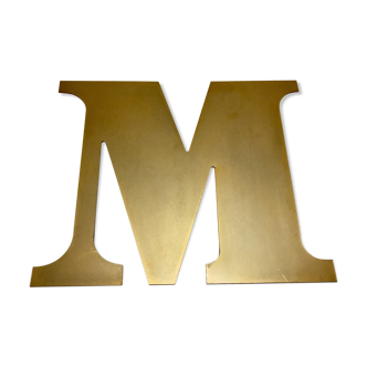 Old store brass sign letter