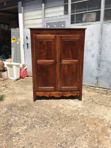 Old rustic farmhouse cabinet in fruit wood