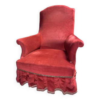 Fauteuil rouge vif a frange