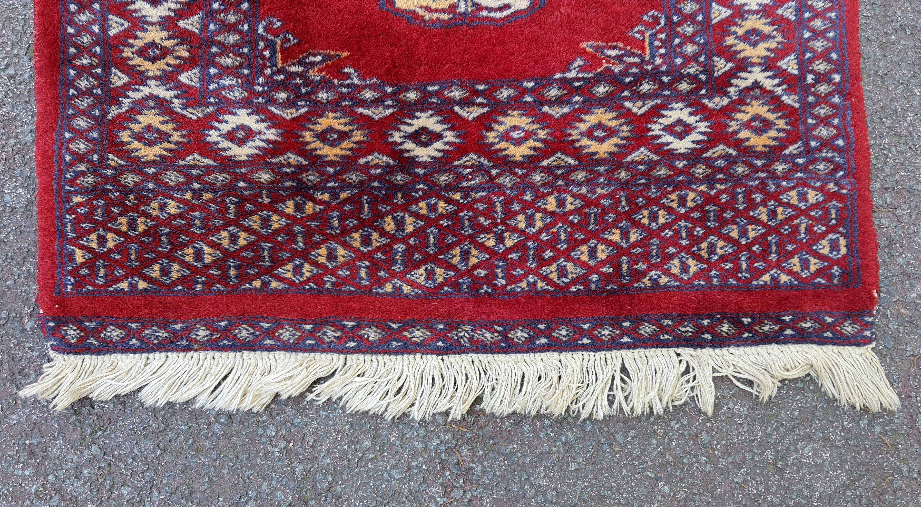 Handmade wool carpet Bukhara Pakistan 118x 61 cm