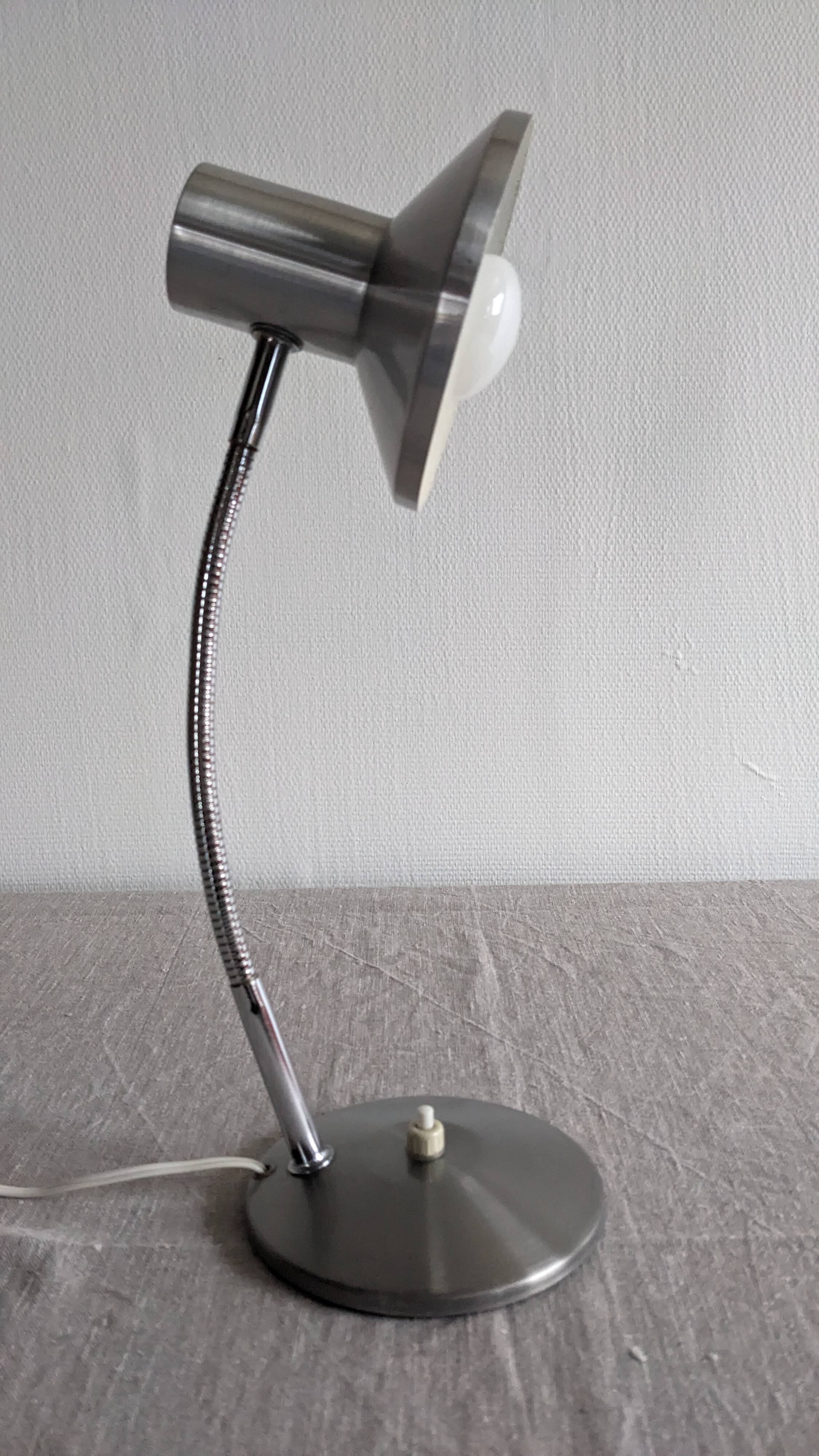 Articulated bedside lamp or wall light, France circa 1960.
