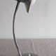 Articulated bedside lamp or wall light, France circa 1960.