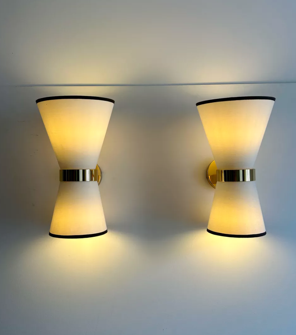 Pair of vintage wall lamps, solid brass and unbleached fabric, Italy 1980
