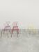 Vintage multicolor stackable wire chairs
