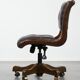 Chesterfield office chair in English style made of cow leather and wood.
