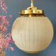 Vintage art deco globe pendant light in yellow and gold granite glass