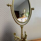 Empire style table mirror in gilded bronze