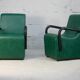 Pair of armrest heaters. Steel and green imitation leather. France, circa 1980