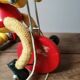 Old Mickey Mouse toy on his wooden tricycle