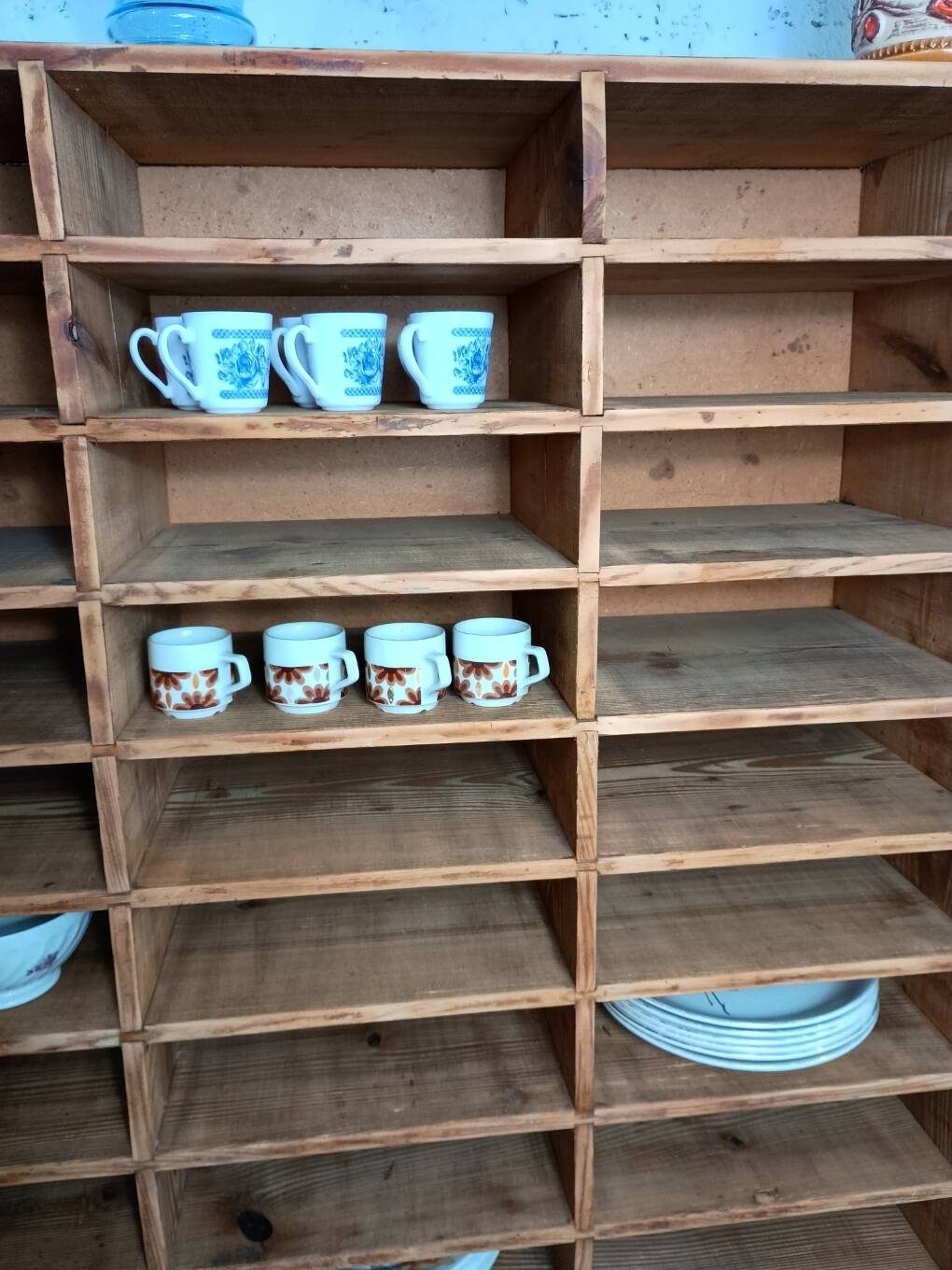 Wooden sorting cabinet with 50 compartments.