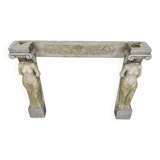 Neoclassical plaster fireplace with caryatids (nude women)