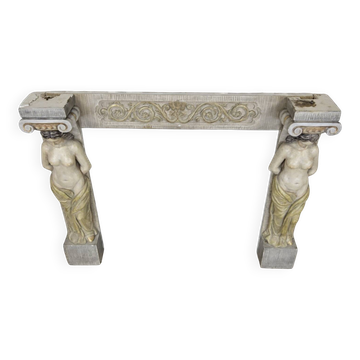 Neoclassical plaster fireplace with caryatids (nude women)