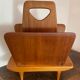 Magazine rack, in oak, by Pierre Cruège
