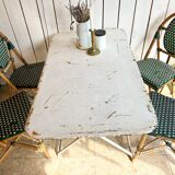 White folding metal bistro table