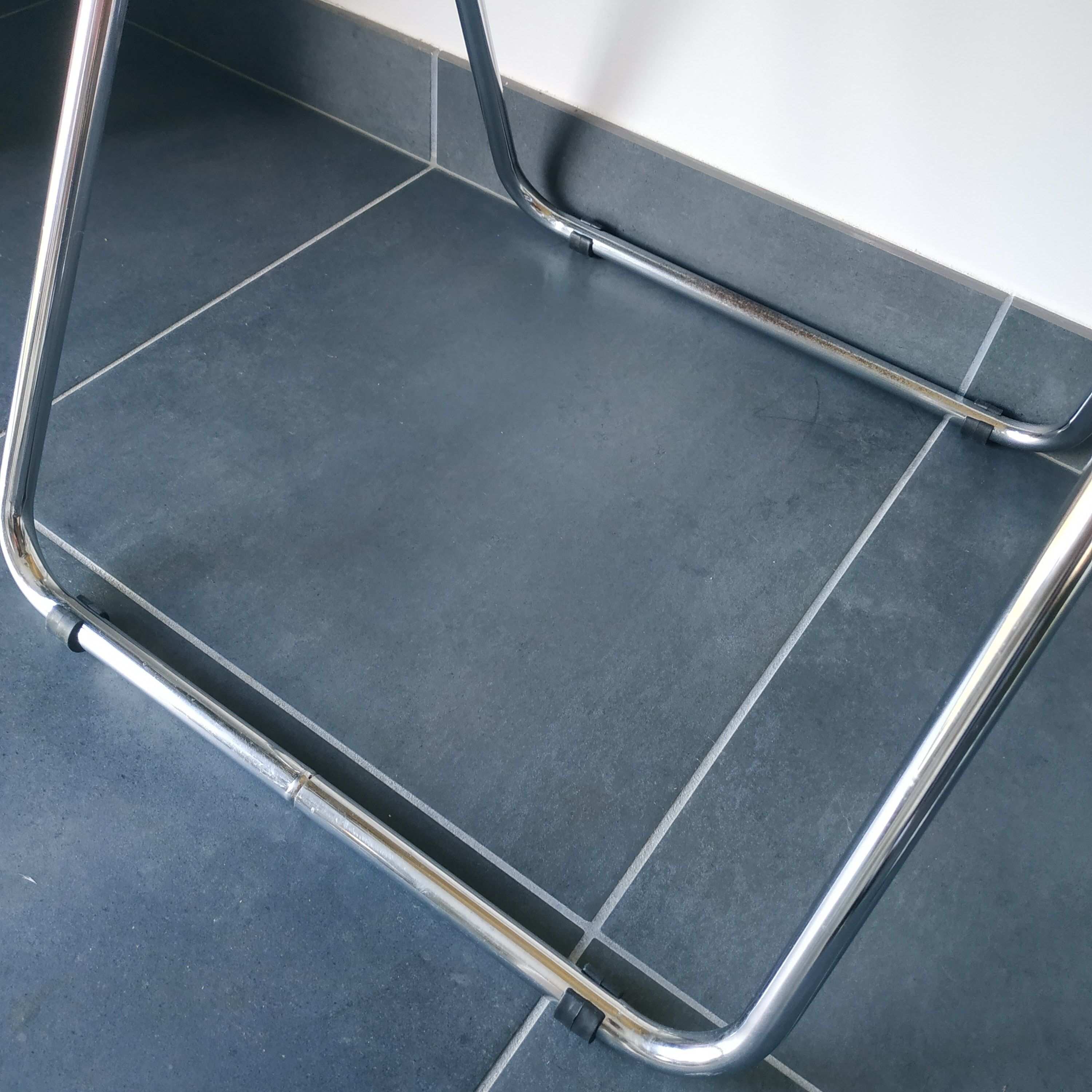 Seventies stainless steel and caramel chairs