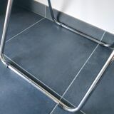 Seventies stainless steel and caramel chairs