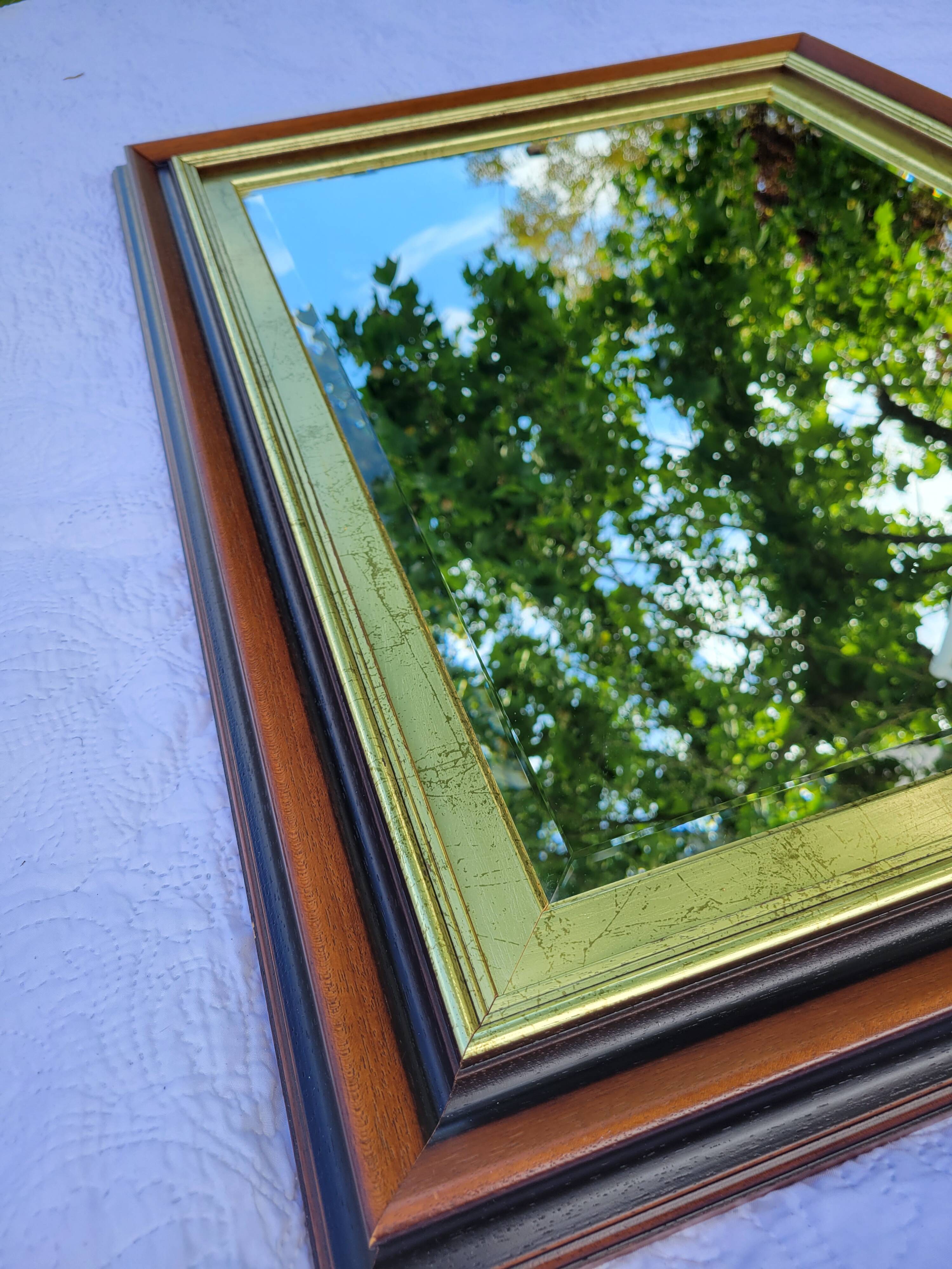 Large wooden and gold mirror