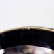 Black and gold 60s round mirror