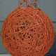 Orange lampshade in cord and rattan from the 1970s
