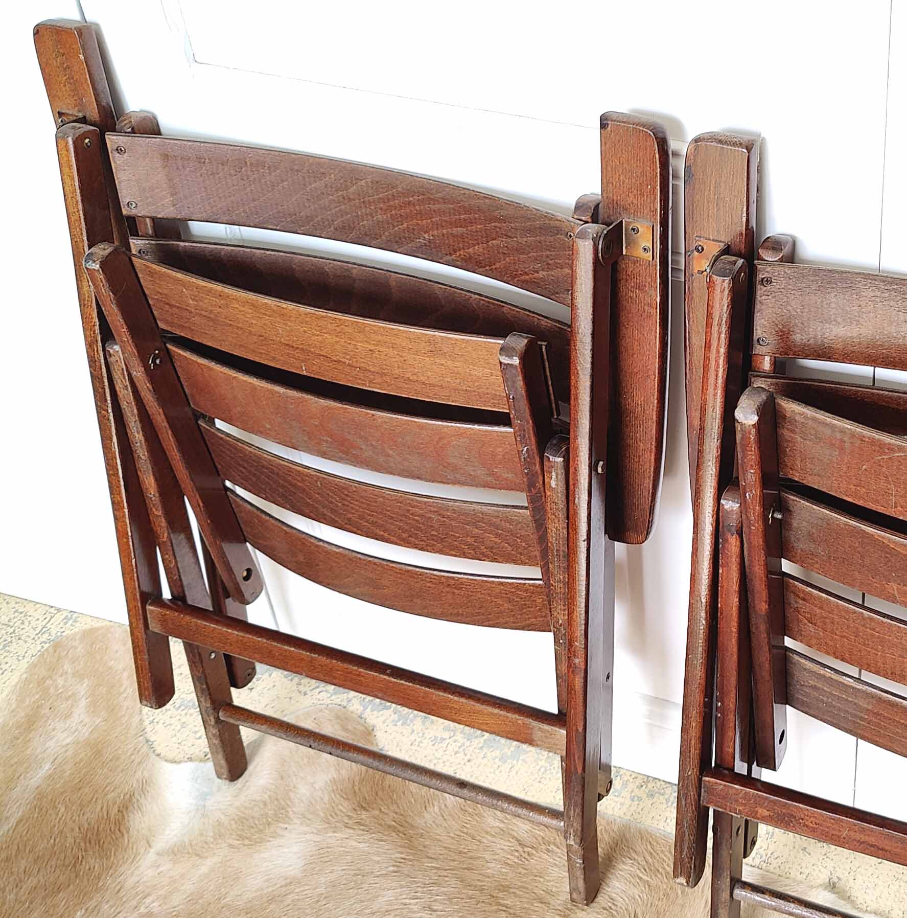 Pair of folding wooden armchairs
