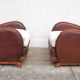 Paire de fauteuils art-déco en cuir