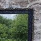 Vintage wooden and stucco mirror in patinated midnight blue with gold – baroque style – 51 ×