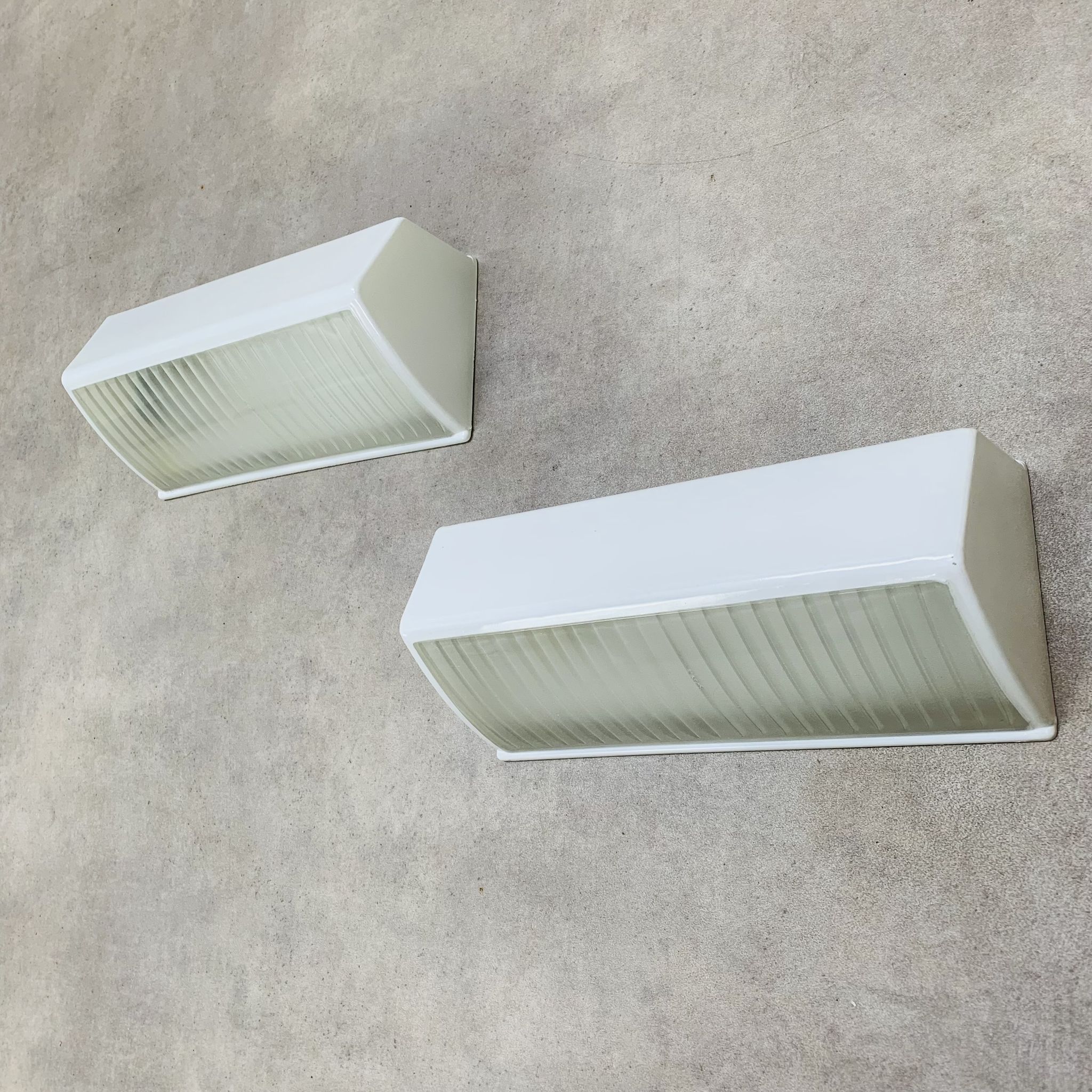 Pair of Holophane Prismopal wall lights, 1950s design.