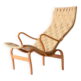 “Pernilla” armchair and footstool designed by Bruno Mathsson