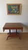 Grande table victorienne réglable.
