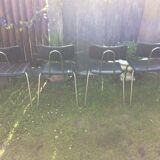 4 Chairs with chrome tubular metal base and black Skaï
