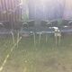 4 Chairs with chrome tubular metal base and black Skaï