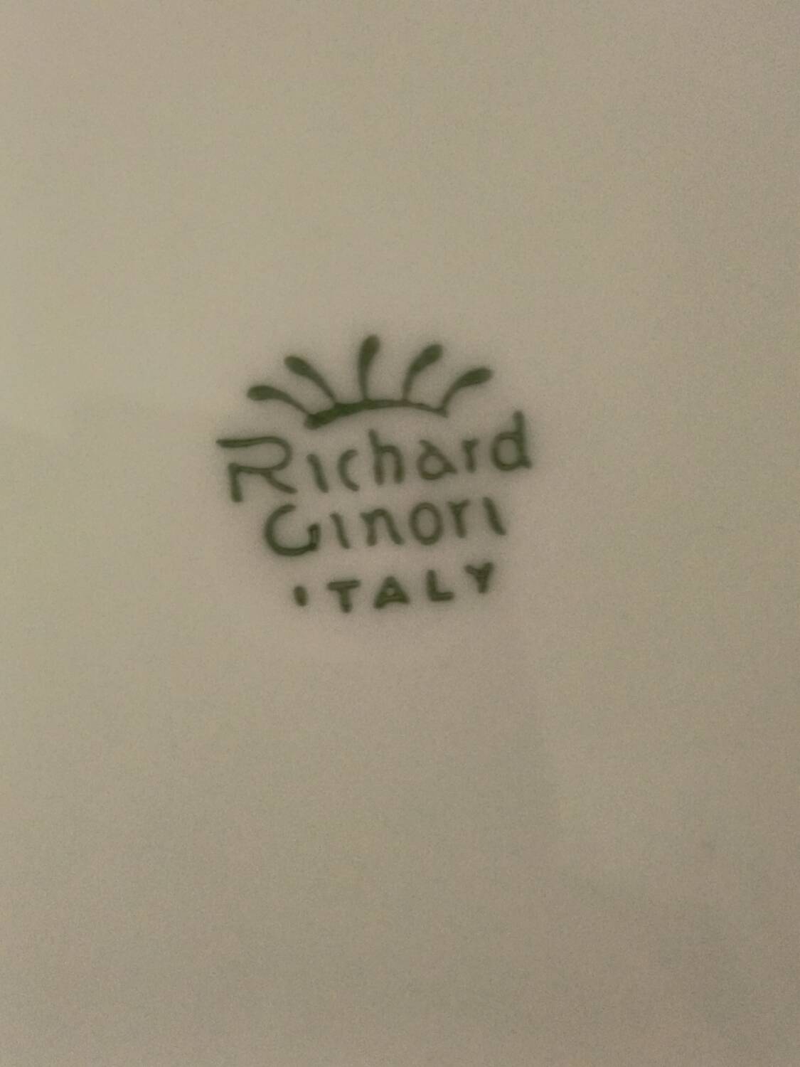 Many vintage flat plates by Richard Ginori.