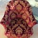 Velvet toad with backrest and firm seat in burgundy red color