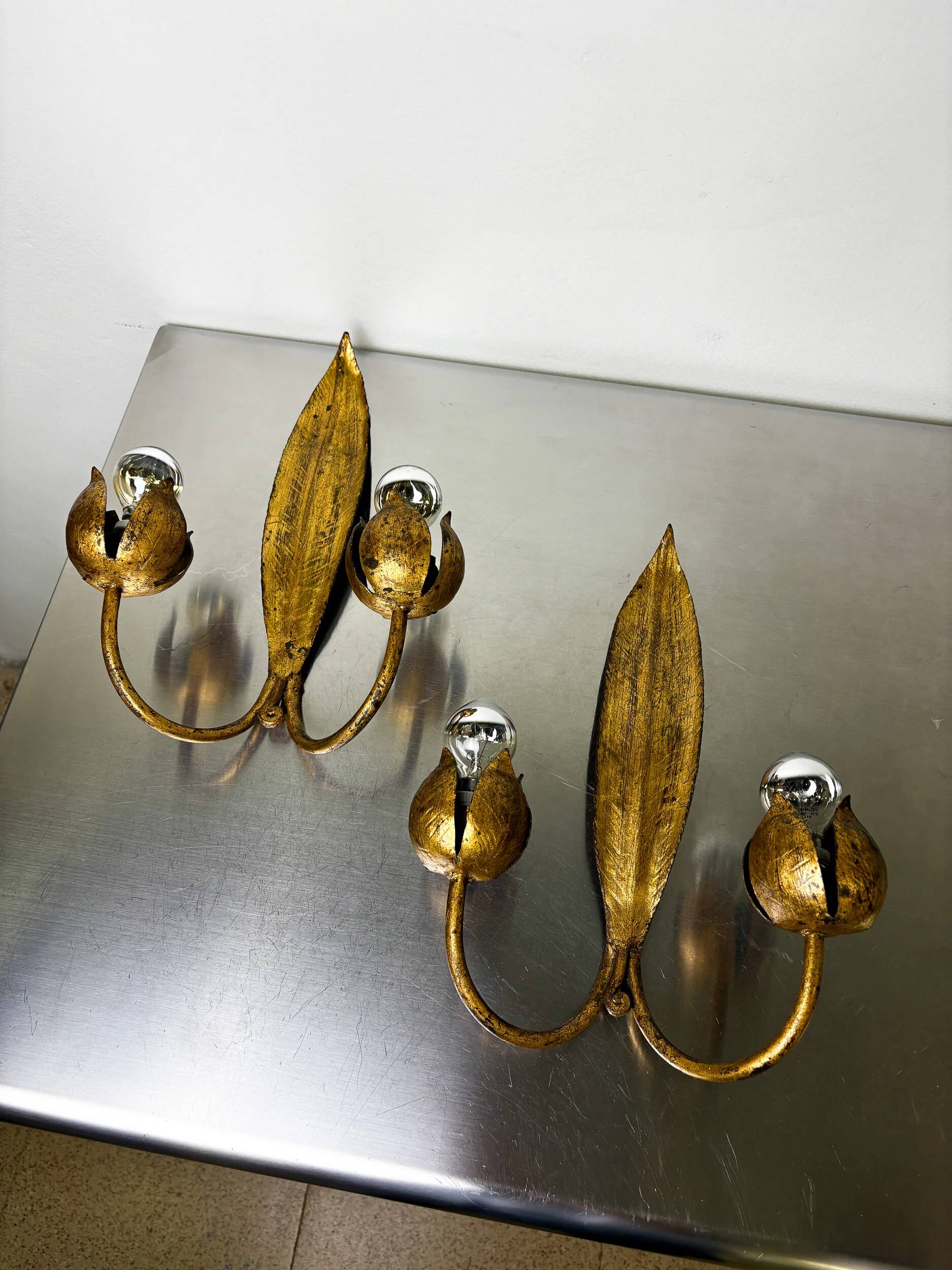 Pair of Spanish foliage wall sconces, leaf arms & bud shades, gilt iron, 1960s