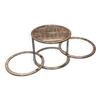 Round coffee table in chrome metal and glass