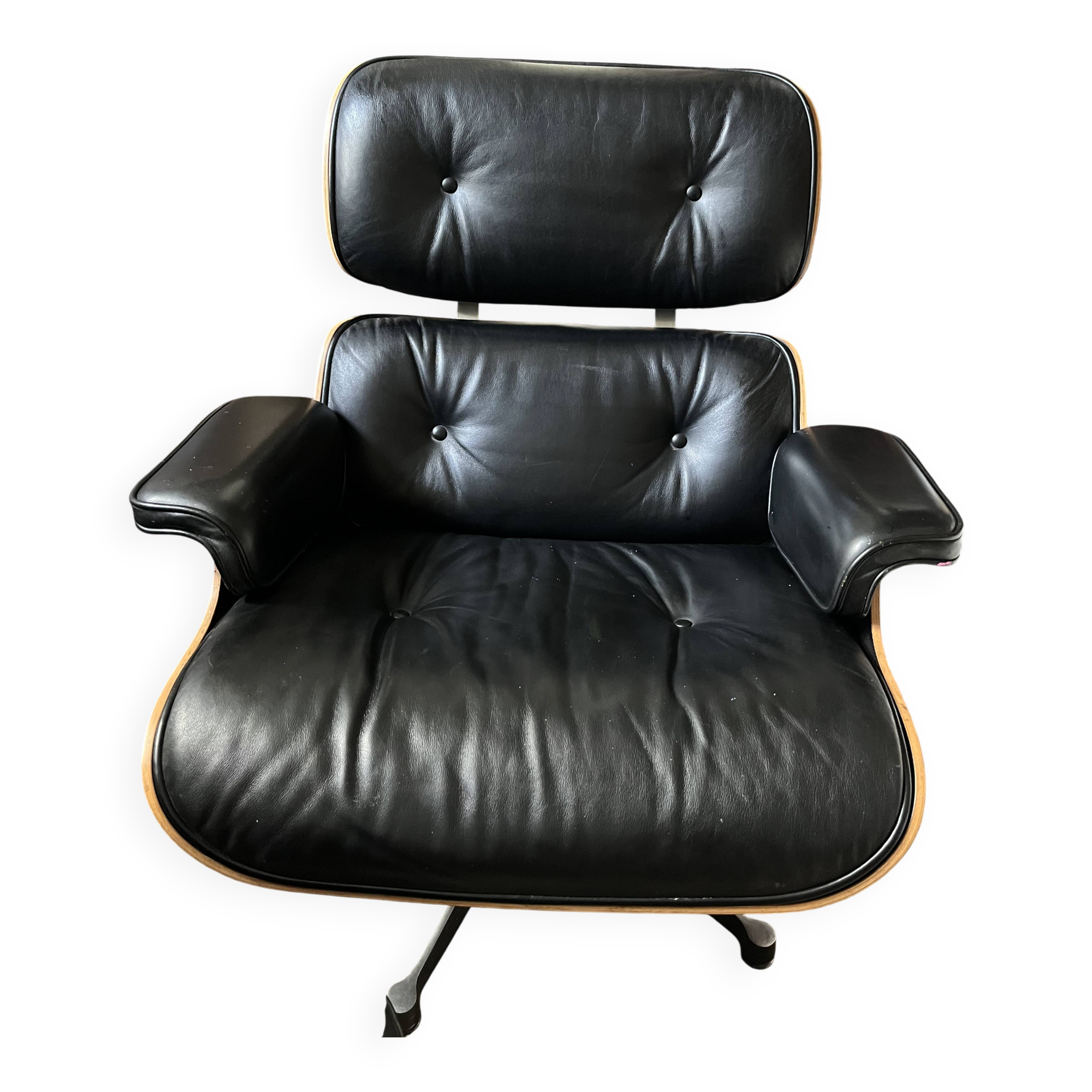 Black leather Eames Vitra armchair, original with rosewood ottoman.