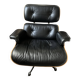 Black leather Eames Vitra armchair, original with rosewood ottoman.