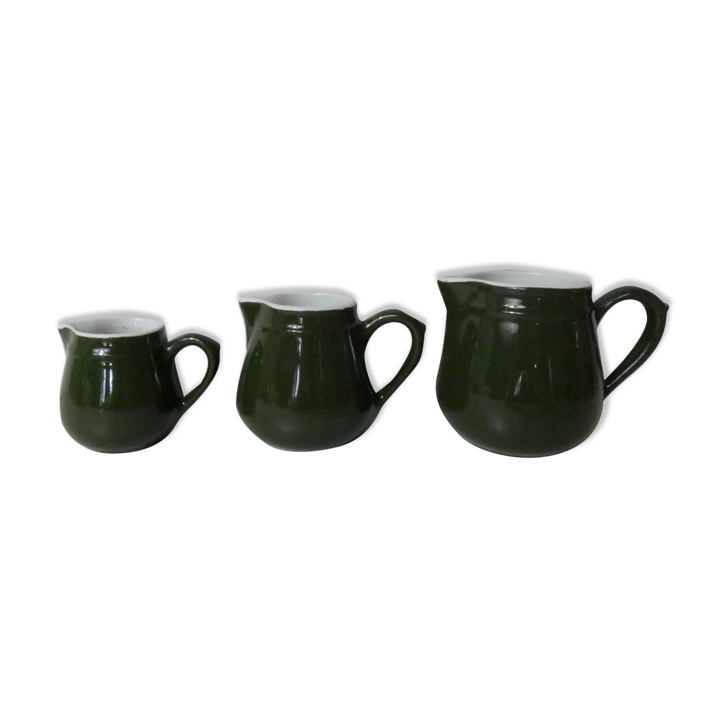 Trio of vintage bistro milk pots pilivite