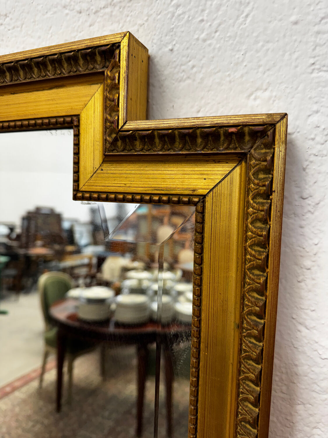 Large gold mirror in the Louis XVI style