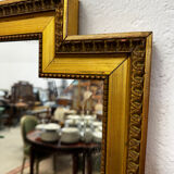 Large gold mirror in the Louis XVI style