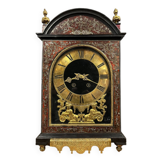 Louis XIV period religious clock in Boulle marquetry decorated with foliage