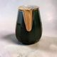 Dark green ceramic decorative jug with golden trim.