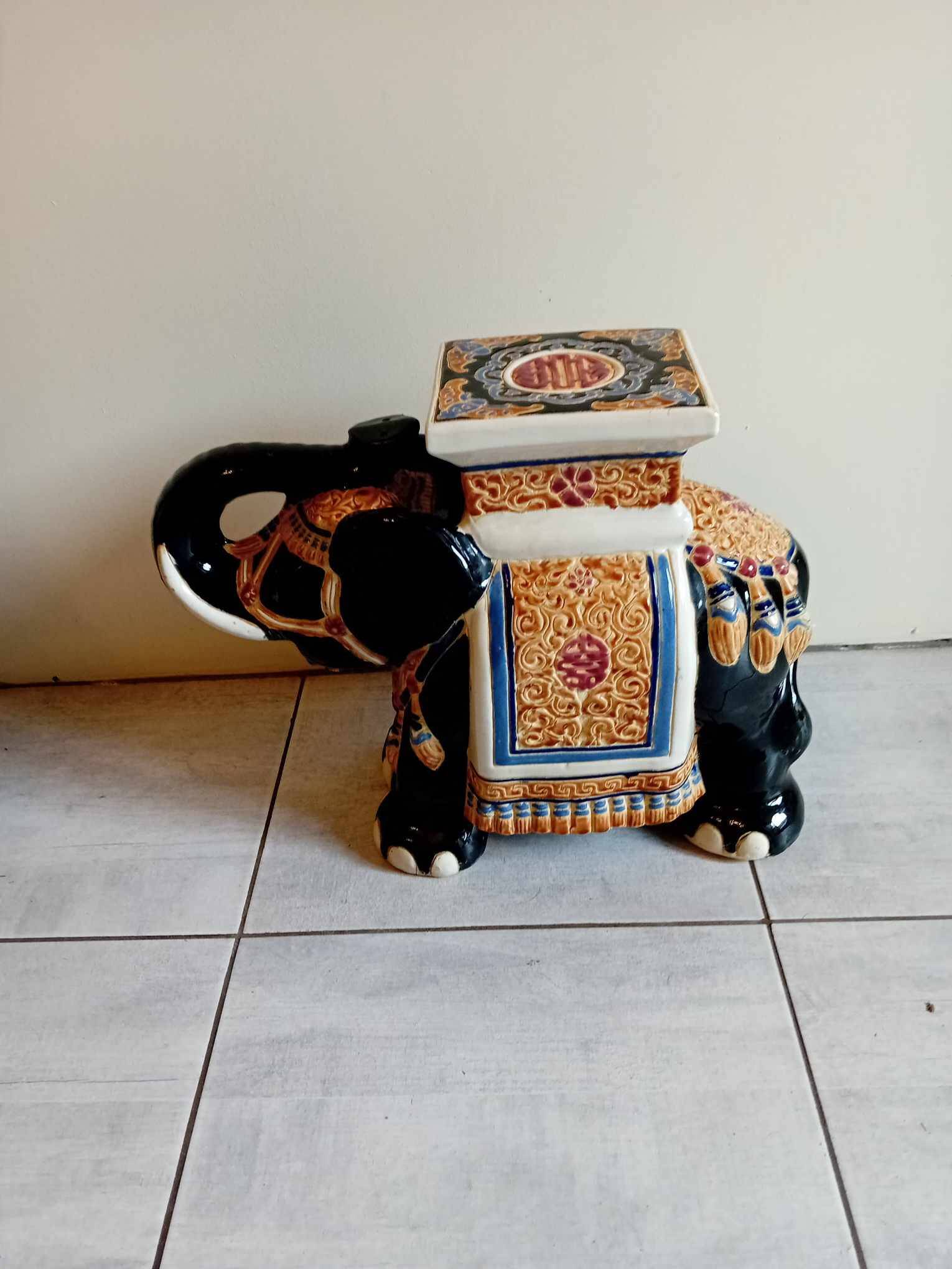 Elephant in black and beige glazed earthenware