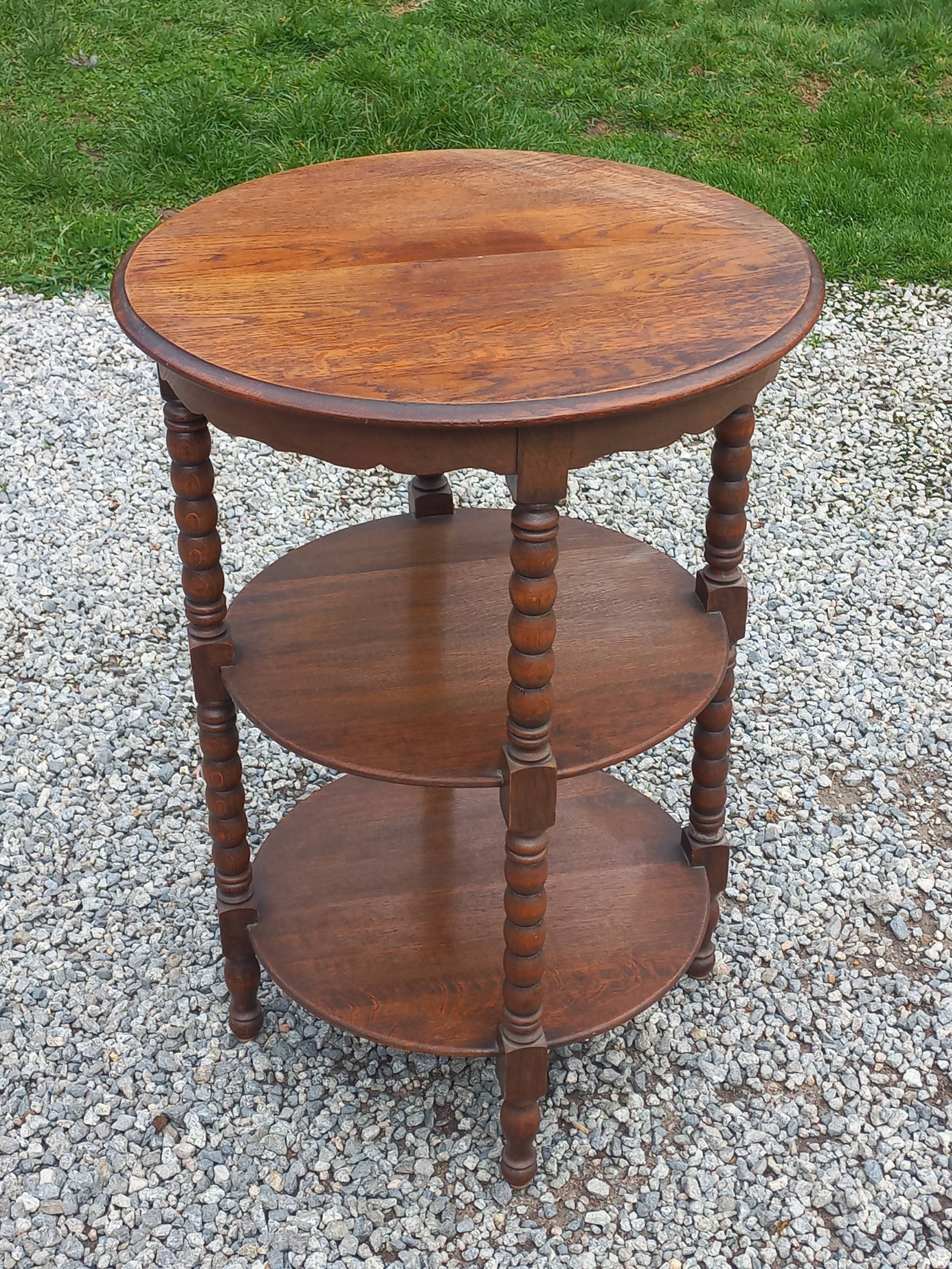 Vintage oak pedestal table with 3 shelves from the 60s