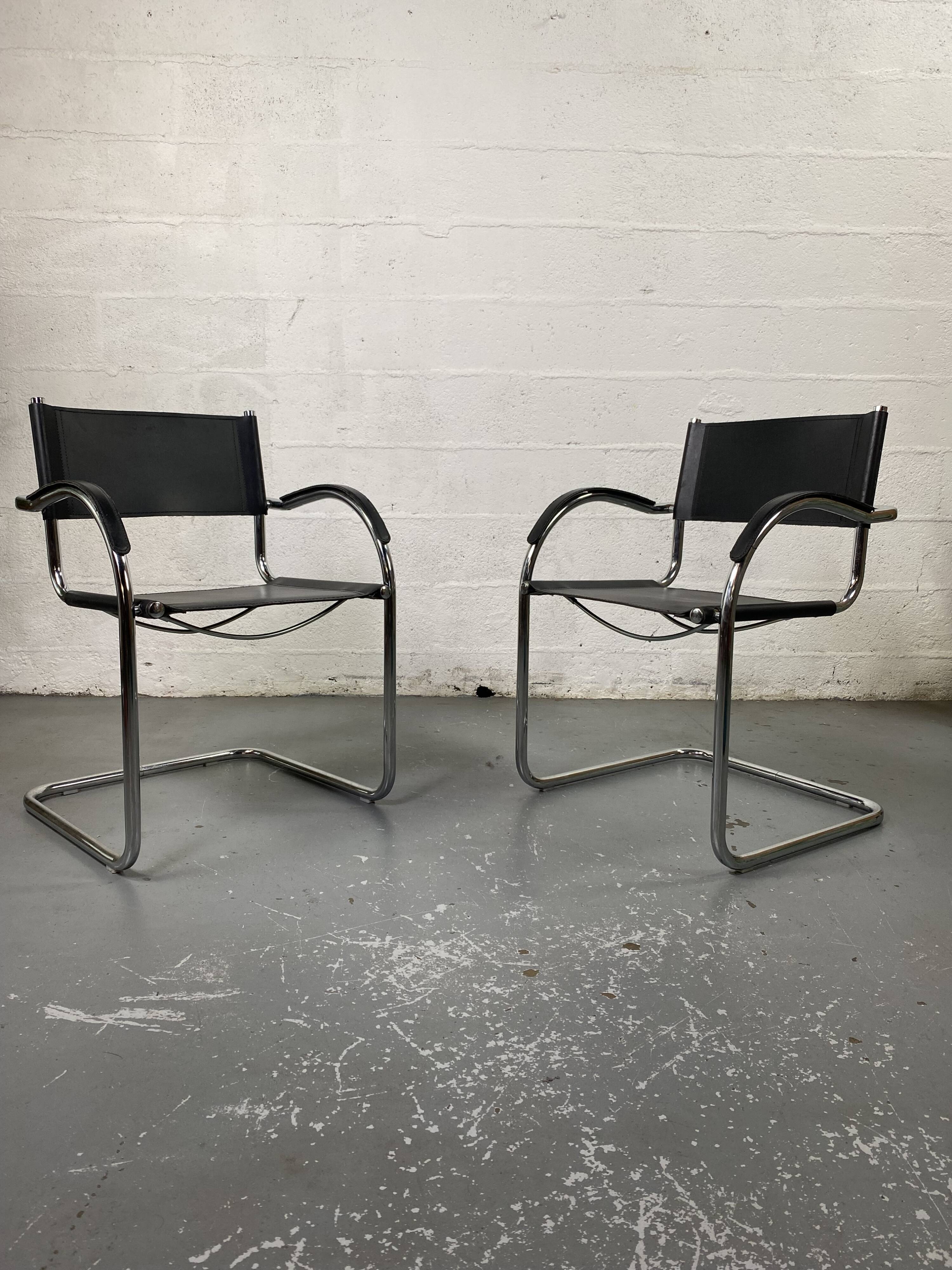Pair of design armchairs in imitation leather chrome